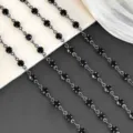 Detail view of black rhinestone chain DIY craft material, sparkling crystal trim for bags. - Gun Black