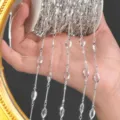 Detailed shot of silver marquise rhinestone chain DIY jewelry crafting material supply. - White Silver