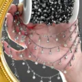 Closeup of DIY rhinestone cup chain with black plating and sparkling crystal stones. - Gun Black / White