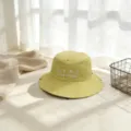 Sombrero de pescador de algodón amarillo con bonito bordado de dibujos animados para niños. - M / Amarillo