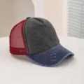 Distressed color-block baseball cap close-up, retro trucker hat with mesh back and rip detail. - M (56-58cm) / Navy Blue + Black