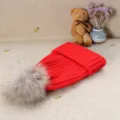 Winter red knit beanie hat with fluffy grey raccoon fur pom pom for women warm daily wear - Red