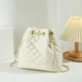 White quilted bucket bag with gold chain strap, chic and elegant daily shoulder bag. - White