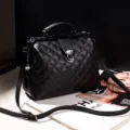 Classic black quilted boston handbag with metal clasp and adjustable shoulder strap for women. - Black Argyle