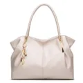 Light gold women shoulder handbag, elegant dumpling bag with cat charm for daily wear - White