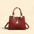 Red leather tote bag with scarf accessory and gold hardware, elegant shoulder crossbody bag. - Burgundy