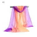 Detail view of a gradient purple and orange chiffon scarf, lightweight and versatile. - US Size 9