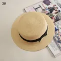 Detail of Korean style straw hat, wide brim design with black ribbon bow for summer sun. - No.3 Flat Brim