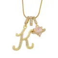 Collier lettre K élégant avec pendentif cœur rose et zircone cubique scintillante. - K-Or (Chaîne Serpent)