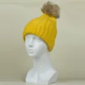 Bonnet tricoté jaune pour enfants avec pompon en fausse fourrure bonnet d'hiver chaud variante - Adulte / Jaune