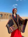 Details of the ethnic style colorful striped shawl cape, showcasing vibrant pattern and warm fabric. - Tops / 130-150cm / Black