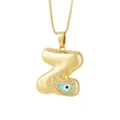 Collana con ciondolo lettera Z placcato oro con occhio greco e zirconi per donna. - Lettera Z