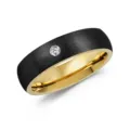 Mens minimalist black titanium steel ring with sparkling single stone gold inner band design. - Black and Gold