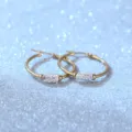 Vergulde roestvrijstalen creolen oorbellen met witte strass cilinder stijl variant. - 2*30mm / Goud