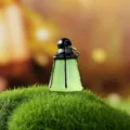 Glow-in-the-dark mini lantern pendant ornament, green luminous charm for garden decor. - Luminous Lantern / Green