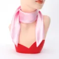 Detail shot of pink silk square scarf, smooth texture neckerchief for women's summer styling. - 60cm x 60cm / Pink