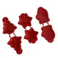 Red plastic Christmas tree star mitten baking molds detail view for holiday cookies pies. - Set
