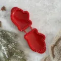 Red Christmas mitten shaped pastry mold, perfect for baking holiday cookies and fruit pies. - Gloves