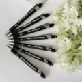 Funny daily pen set featuring seven black stylus ballpoint pens with witty weekly phrases. - 7 Pieces/Pack