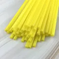 Detail view of yellow plastic drinking straws, bulk pack for daily use or DIY crafts. - Yellow