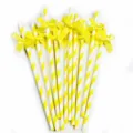 Yellow striped paper straws with cute bows, perfect for birthday parties and dessert tables. - Yellow Striped Ribbon Bow Straws