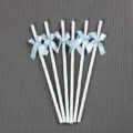 Blue and white striped paper straws with sweet ribbon bows for party and birthday decoration. - Light Blue Striped Bow Straws