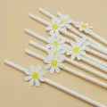 Creative white paper straws decorated with cute daisies, perfect for party and table decor. - Small Flowers & Pure White Straws