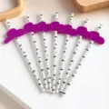 Paper drinking straws with purple mini top hats and funny mustache patterns for party decor - Moustache Top Hat