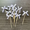 White ribbon bow cake toppers detail view, fabric bow bamboo picks for party dessert decoration. - 10 Pcs Per Pack / White Bow Picks