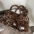 Borsa per laptop con stampa leopardato chic con manici imbottiti morbidi, elegante. - Marrone