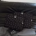 Black embroidered bow laptop sleeve with pearl zipper for daily use and protection. - S / Black and Pink