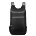 Lightweight foldable outdoor backpack, black travel daypack with mesh straps and zip pockets. - Black