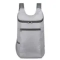 Lightweight foldable grey backpack with breathable mesh straps and multiple secure zipper pockets. - Light Gray