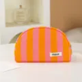 Gestreifte Kosmetiktasche fuer Reisen, tragbare Make-up-Tasche mit Reissverschluss aus Frottee. - Orange-lila Streifen