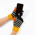 Detail shot of black and white striped knit touch screen gloves with yellow cuffs for winter warmth. - Contrast Color Striped Gloves