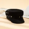 Close-up detail of black baker boy cap featuring metallic star studs and flat top design. - M (56-58cm) / Black 13 Five-Pointed Stars