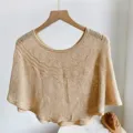 Summer hollow-out knitted cape for women, elegant beach sunscreen shawl and stylish outerwear. - Beige with Brooch