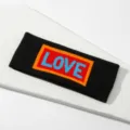Cinta de pelo deportiva tejida con logo LOVE, banda absorbente de sudor para fitness yoga. - Negro LOVE