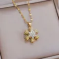 Gold snowflake pendant necklace detail view, sparkling rhinestone clavicle chain jewelry. - Gold Snowflake (X0579)