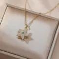 Exquisite gold flower pendant necklace sparkling cubic zirconia with green center stone chic jewelry. - Rotating Pentagram Necklace (X4614) / Gold