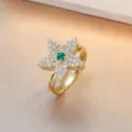 Gold-plated star flower ring with sparkling white zirconia and green center stone. - Bauhinia Ring (J0386) / Gold