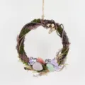 Paas decoratieve rotan krans met eieren en vlinder, gedetailleerd uitzicht voor feest. - Stijl 09