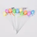 Picconi di uova di pasqua con glitter colorati steli floreali decorativi per feste di primavera. - Stile 14
