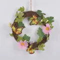 Spring vine wreath with pink daisies and yellow butterflies for Easter holiday home decoration - Style 17