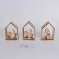 Wooden Easter table decoration ornament set with hollow design, perfect for holiday festive display. - Hollow House Ornament Set