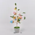 Easter decorative tree table centerpiece with colorful painted eggs and green leaves in pot. - Style 23