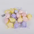 Ensemble d'œufs de Pâques pailletés colorés avec rubans pour décoration de fête à la maison. - Groupe 36