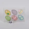 Set de 6 œufs de Pâques décoratifs en plastique coloré dans une boîte transparente. - Groupe 37