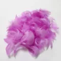 Detail shot of fluffy pink craft feathers, perfect for Bobo balloon filling and DIY crafts. - Violet