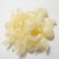 Light yellow fluffy goose feathers, ideal for DIY crafts and balloon fillers. Detailed view. - Pale Yellow